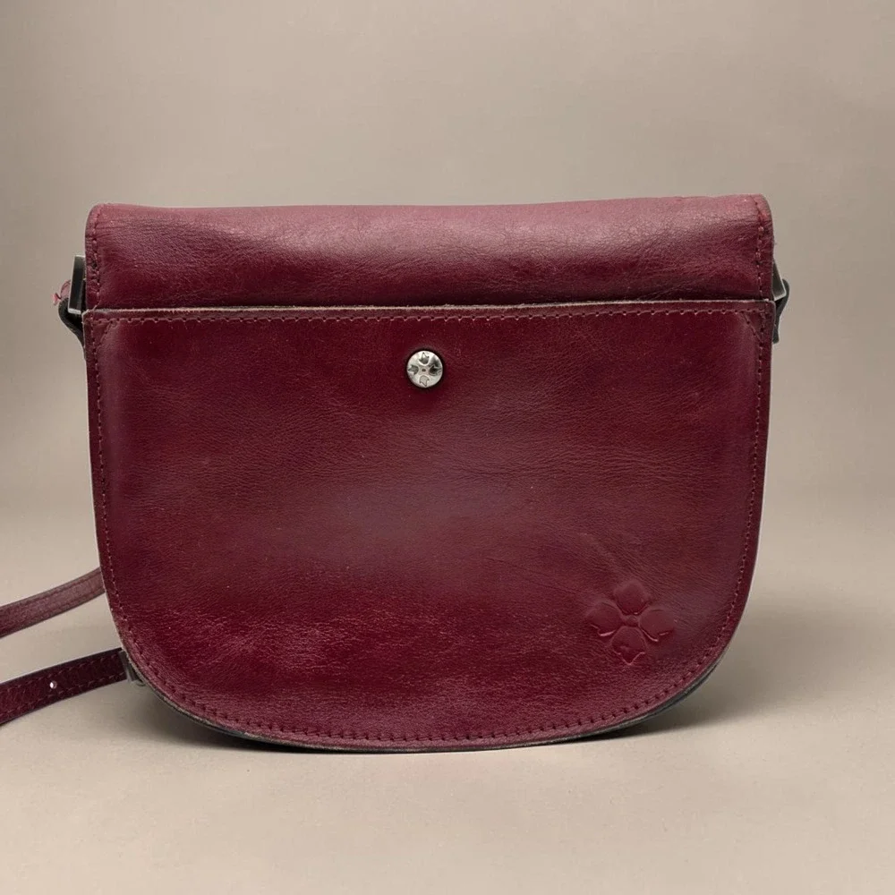 Patricia Nash Red Brinlee Saddle Crossbody Rose Tooled Leather Tassel Card Slots